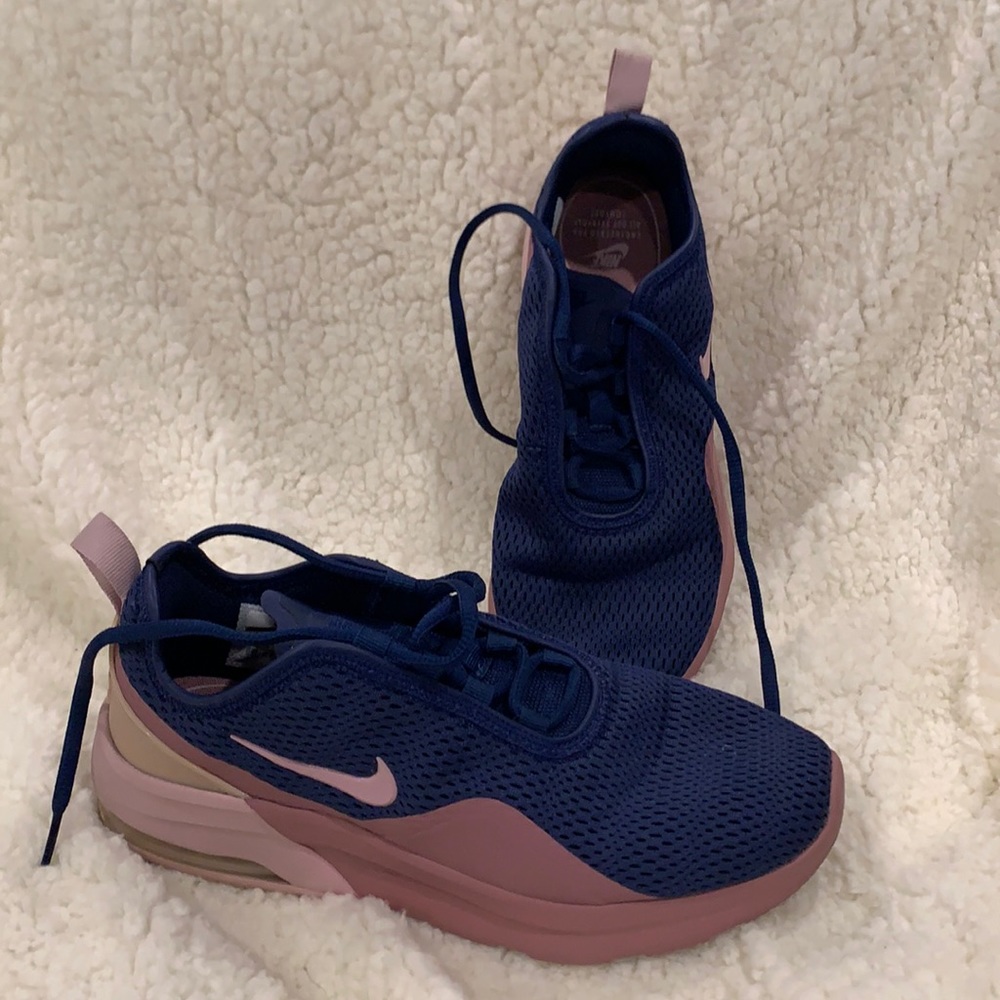 Nike air. Worn a handful of times. Size 8.5. Blue Ans shades of pink.